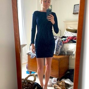 Navy blue form fitting cocktail dress with zipper down the whole back